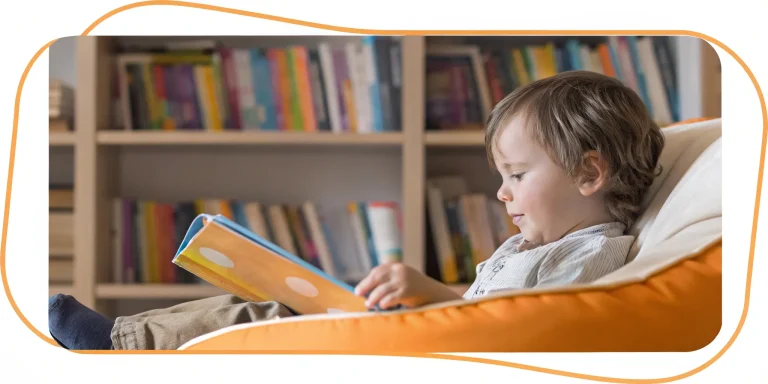 Young reader immersed in a book.